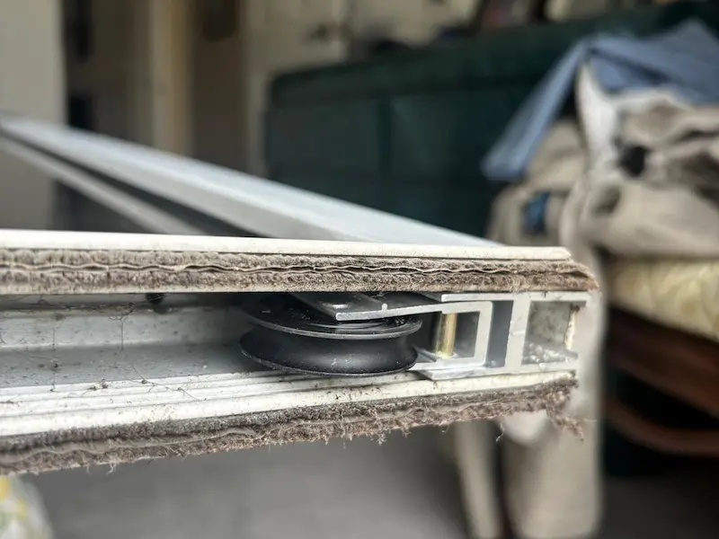 Replacement of roller for sliding door that was in poor condition