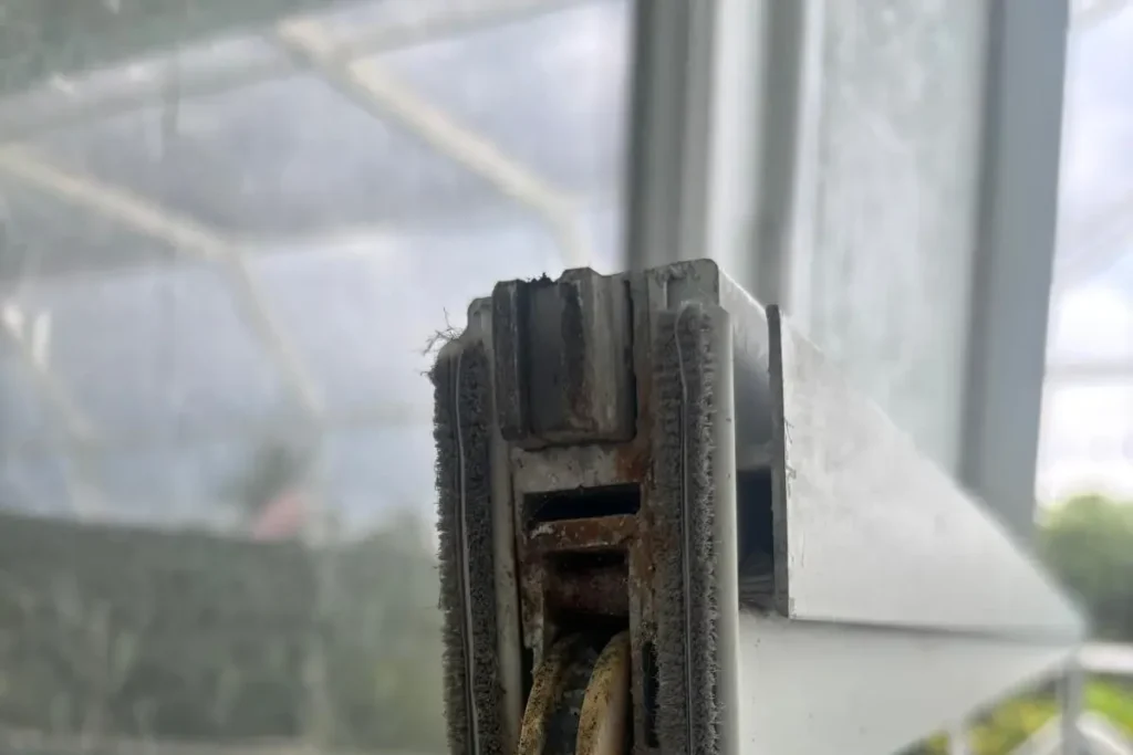 Sliding door removed to replace rollers
